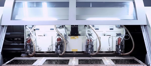 Automated industrial machinery for large-scale pcba manufacturing.