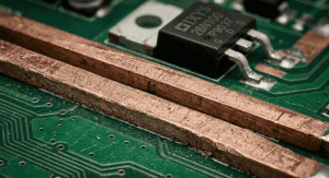 Close up of thick metal traces representing a heavy copper PCB design for high current applications