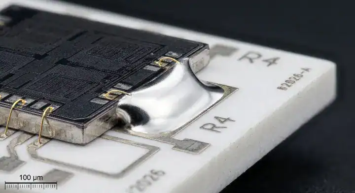 When to use ceramic PCB Macro view of a flawless solder joint on a ceramic substrate demonstrating CTE matching reliability cleanup
