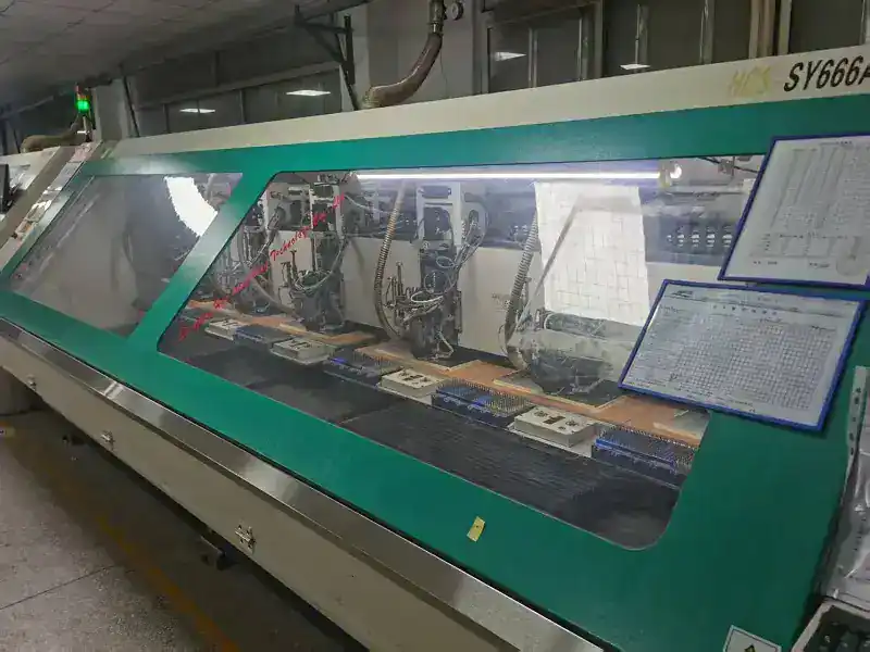 CNC drilling machine processing microvias for HDI multilayer PCB fabrication