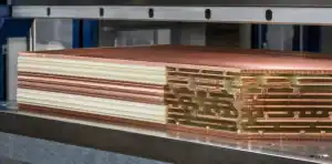 A manufacturing view of multilayer PCB resin flow featured view of prepreg and copper stack-up preparation.