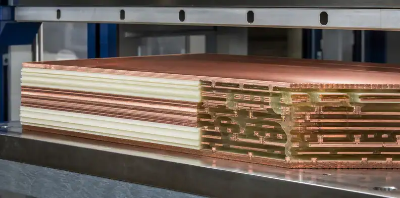 A manufacturing view of multilayer PCB resin flow featured view of prepreg and copper stack-up preparation.