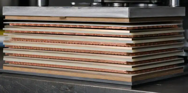 A manufacturing view of multilayer PCB resin flow showing layered press construction and thickness control.