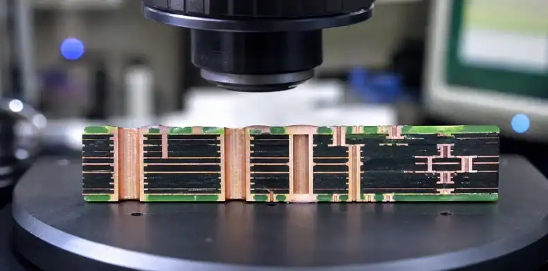 An engineering scene for PCB Z-axis CTE showing plated through holes and microvias under inspection.