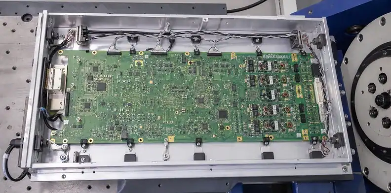 A representative enclosure boundary supports large PCB vibration testing.