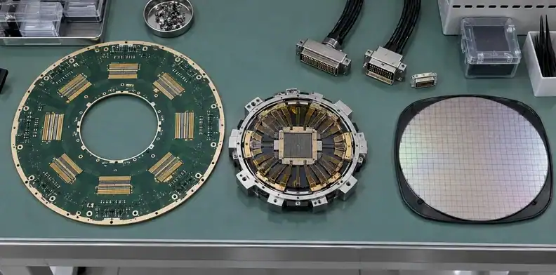 A probe card PCB, separate probe-head module, connectors, and silicon wafer are arranged on an ESD bench.