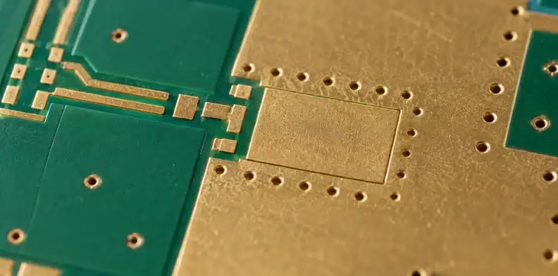 A flush copper insert sits beside surrounding ground copper and short microstrip traces.